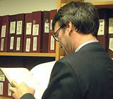 Man searching the archives